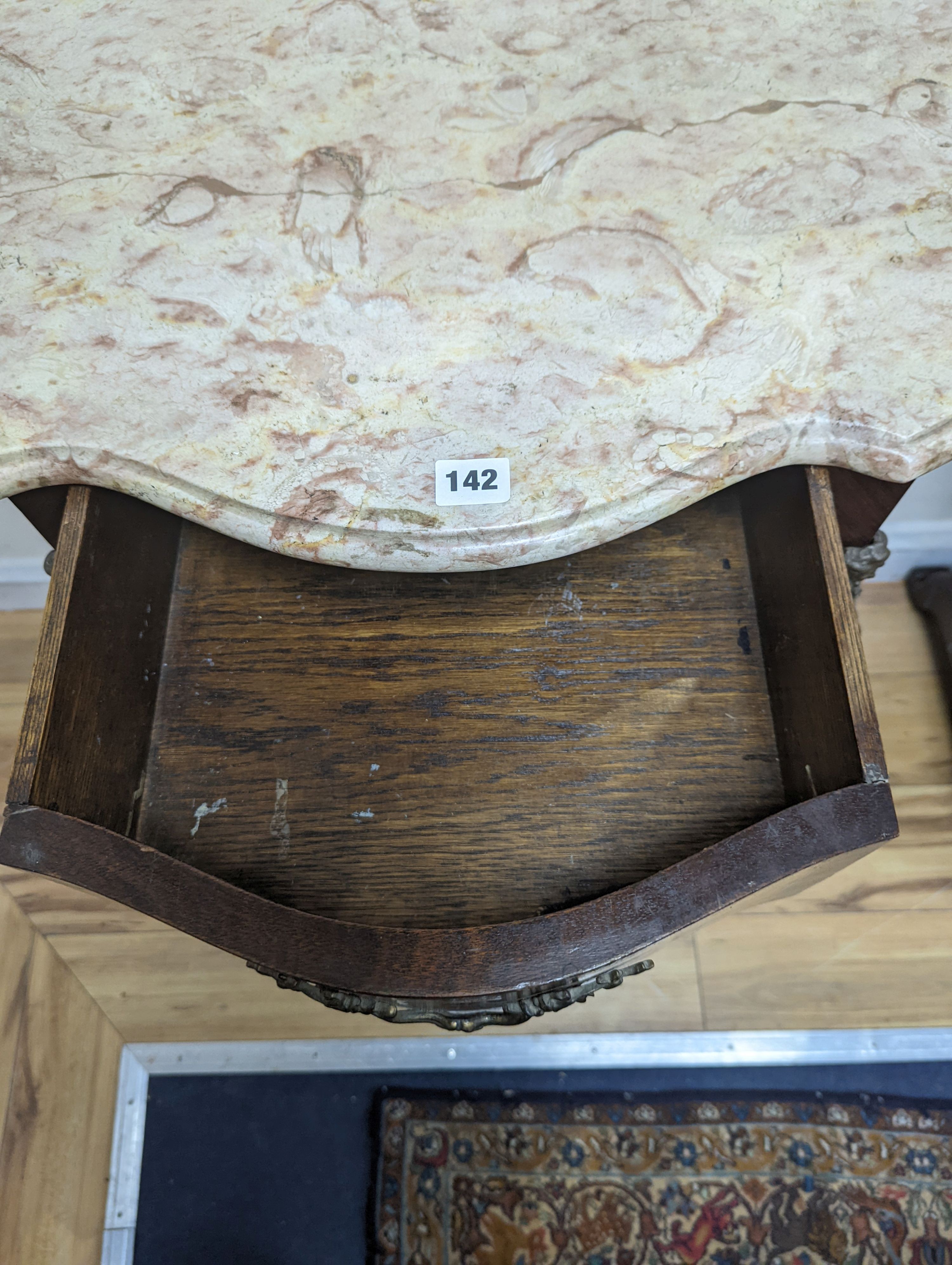 A Louis XVI design marble top serpentine console table. W-102cm, D-47cm, H-91cm.